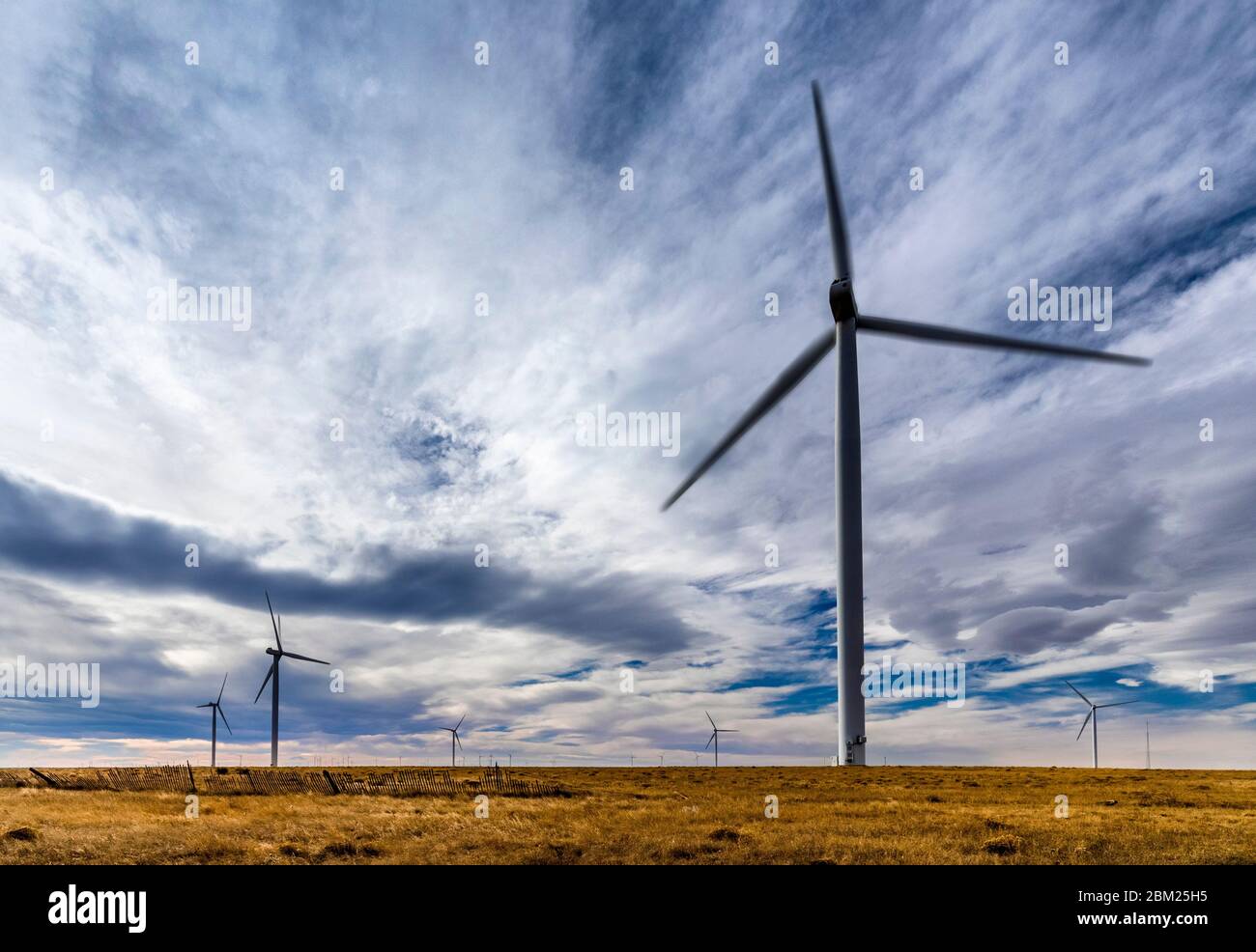 Massive wind turbines fill the plains of western Nebraska, USA. Stock Photo