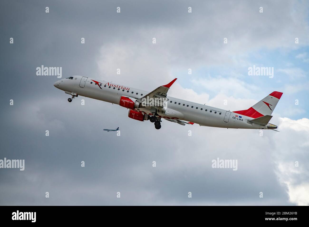 Frankfurt, Hesse/Germany - 23.07.2019 Austrian aircraft (Embraer 195 - OE-LWA) taking off from Frankfurt Airport with a Lufthansa jet in the backgroun Stock Photo