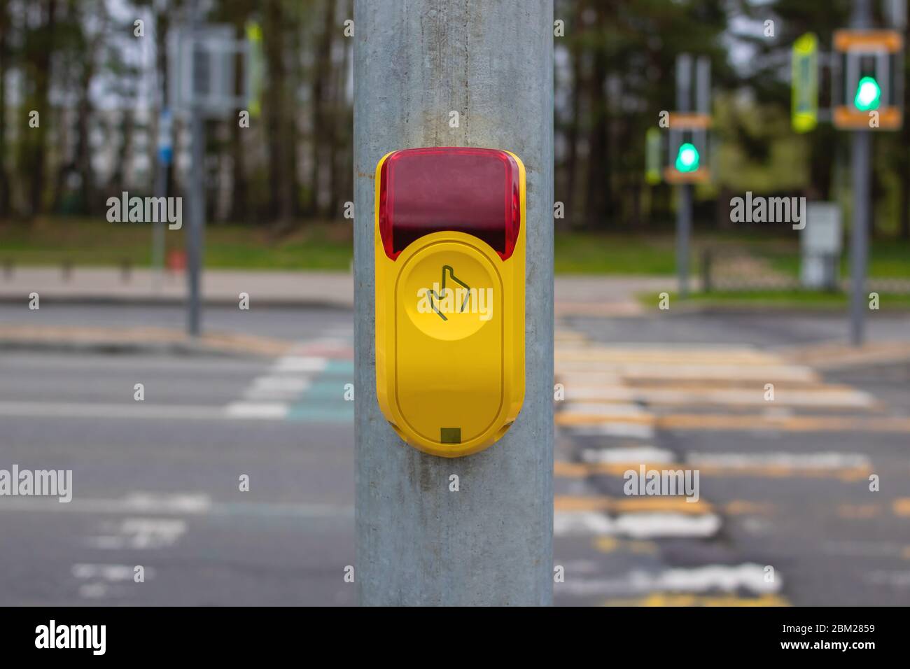 Traffic light button at a pedestrian crossing Stock Photo - Alamy