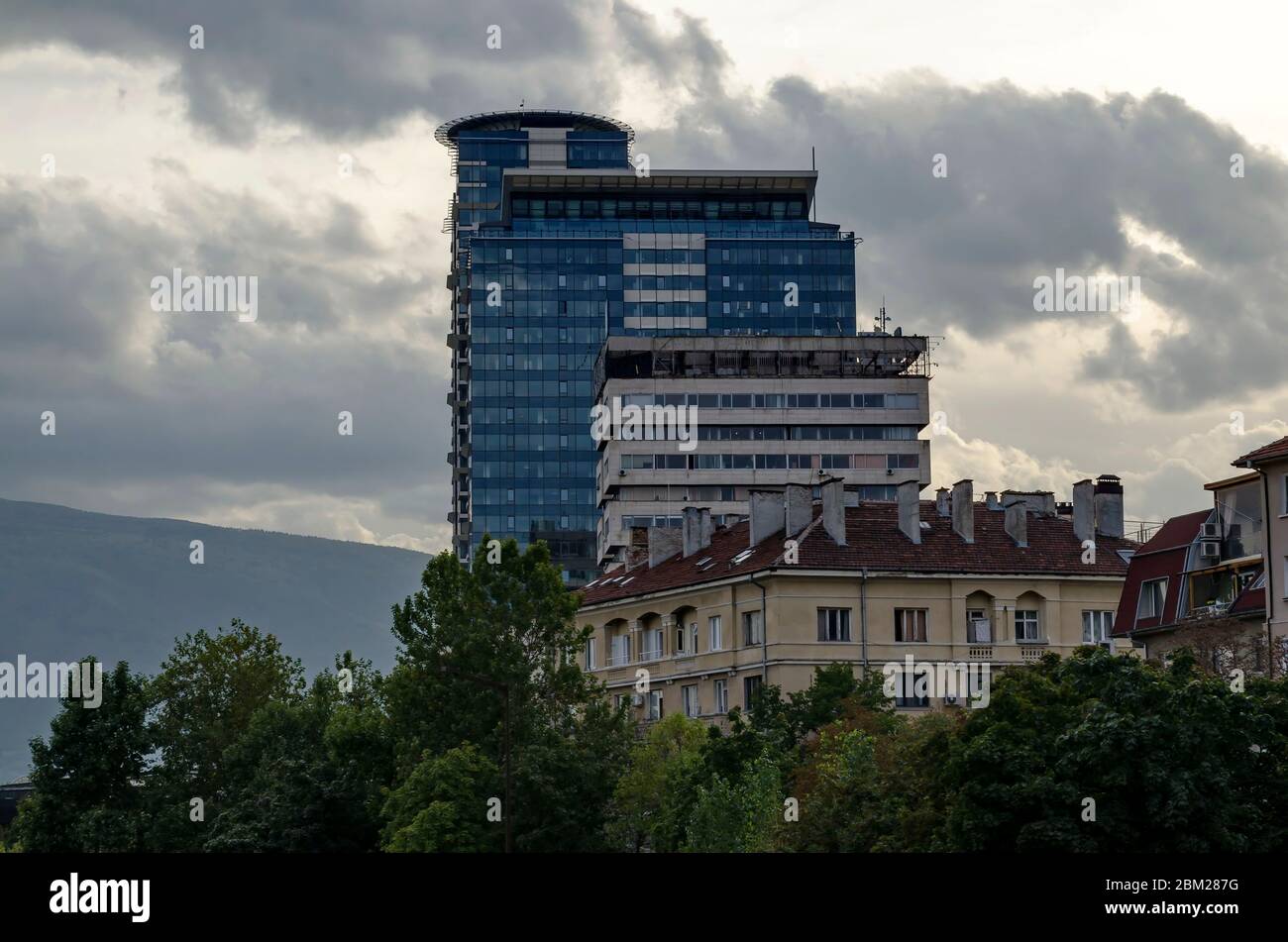 A residential neighborhood with old and new modern contemporary houses in the center of the Bulgarian capital Sofia, Bulgaria Stock Photo