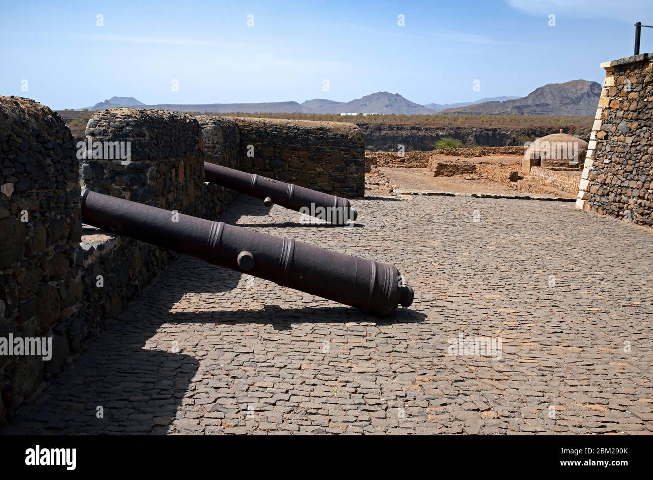 Old cannons and cistern in 16th century fortress Forte Real de São Filipe looking over the city Cidade Velha on the island Santiago, Cape Verde Stock Photo