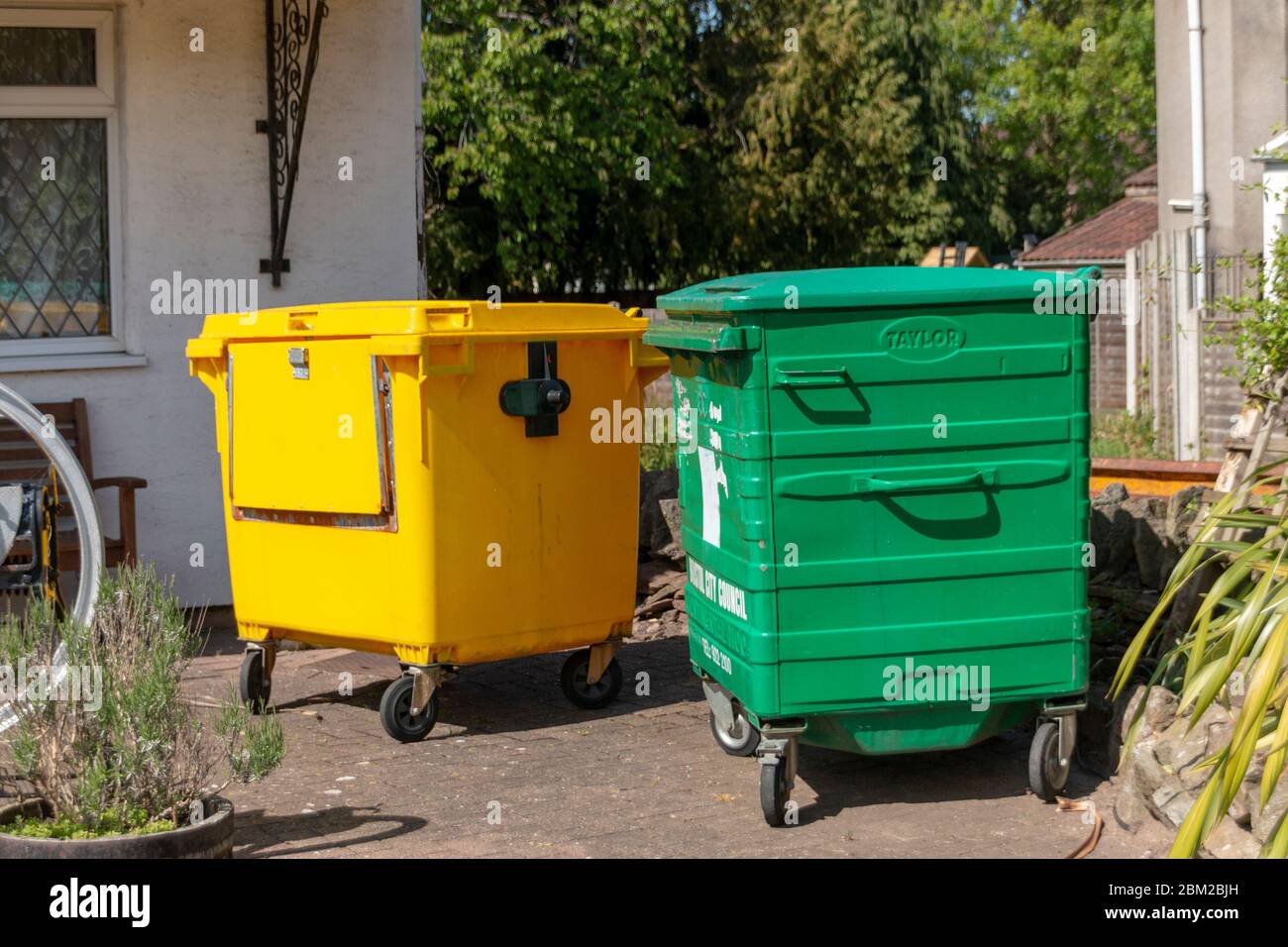 Blue yellow green recycling bins hires stock photography and images