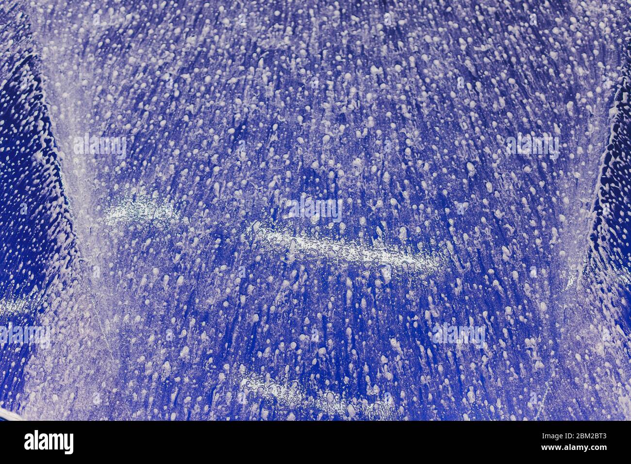 foam and soap on black background. abstract pattern Stock Photo