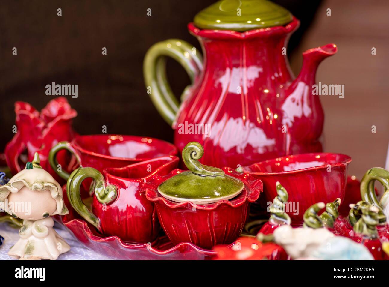 Set of clean dishes and cups . Handmade ceramic, catering, restaurant, healthy eating.Porcelain multi-colored dishes. multi-colored glass decorative t Stock Photo