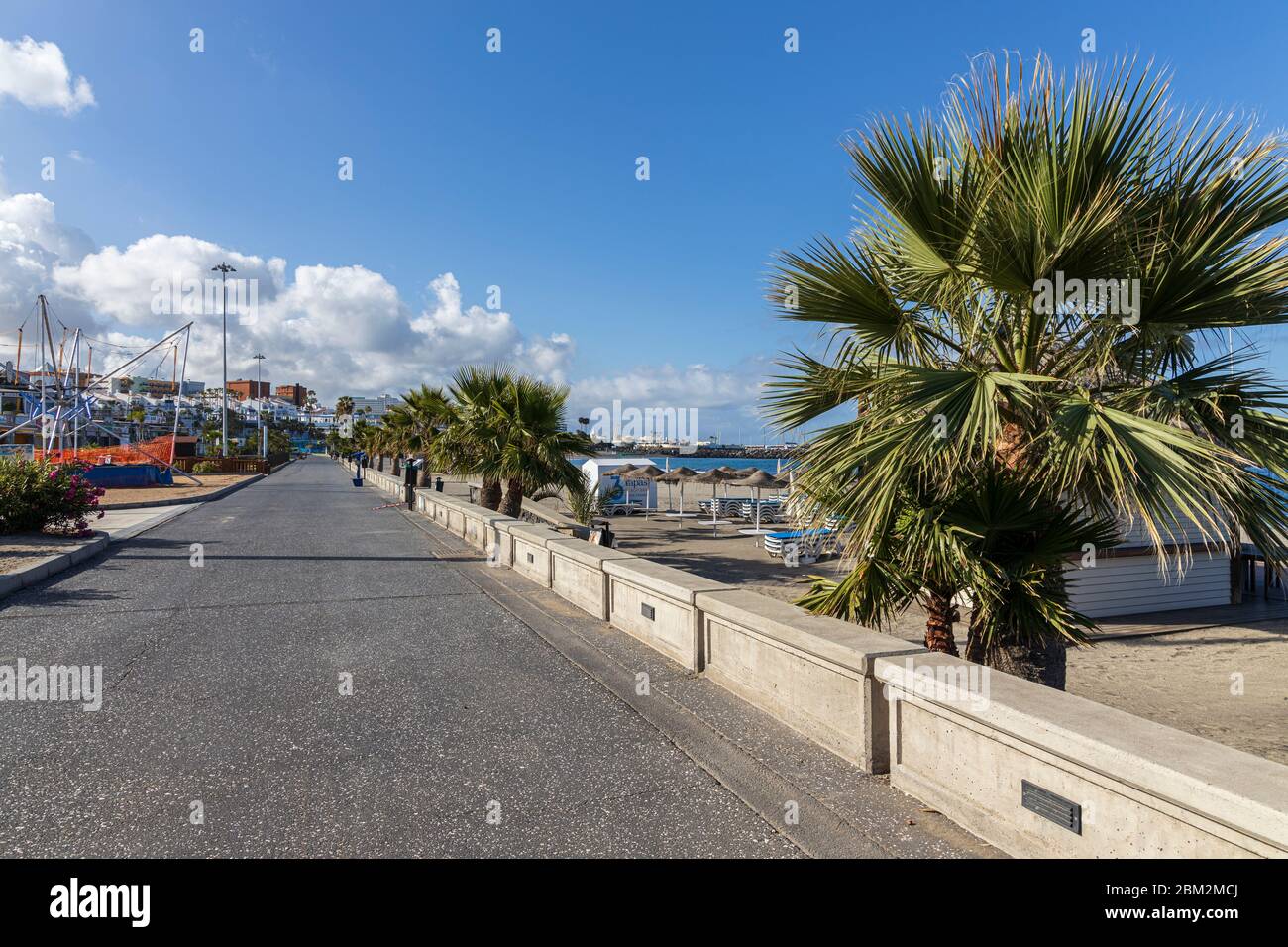 Empty walkway along Playa Fanabe beach during the Covid 19 State of Emergency in Tenerife, Canary Islands, Spain Stock Photo