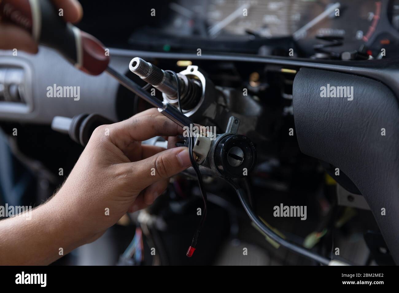 Close Up car steering wheel repair after the accident. Disconnecting of
