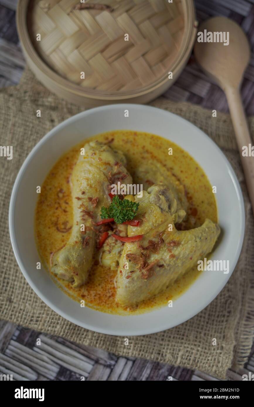 Opor Ayam (Indonesian Curry), Chicken cooked in coconut milk and spices ...