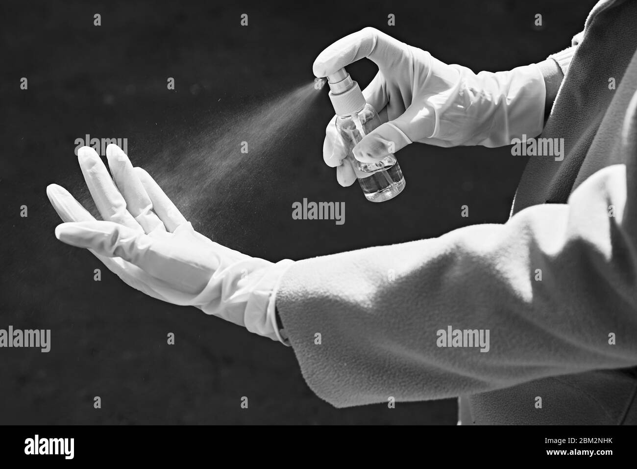 Doctor antiseptic in hand Black and White Stock Photos & Images - Alamy