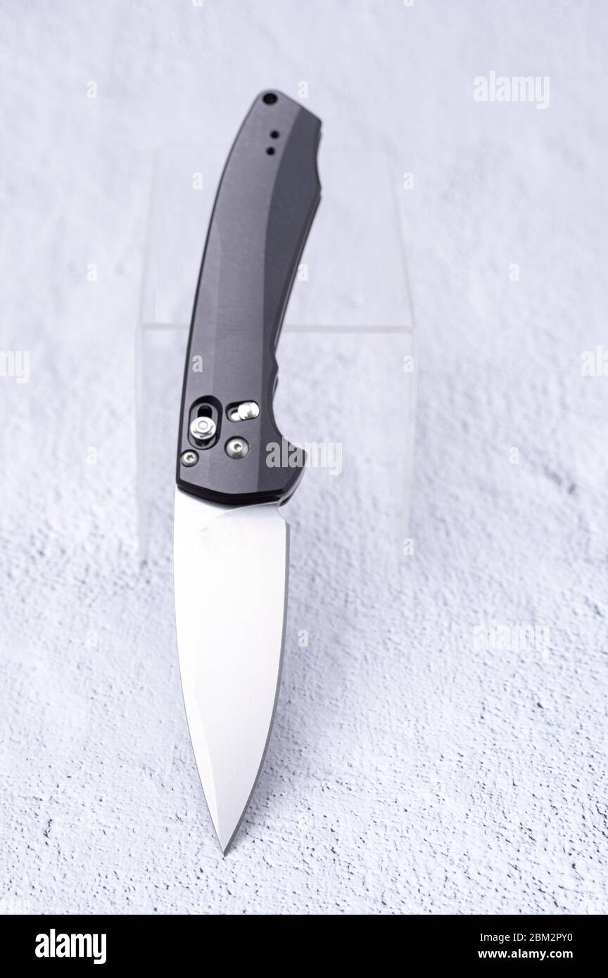 The knife in an upright position is inclined at an angle. Stock Photo