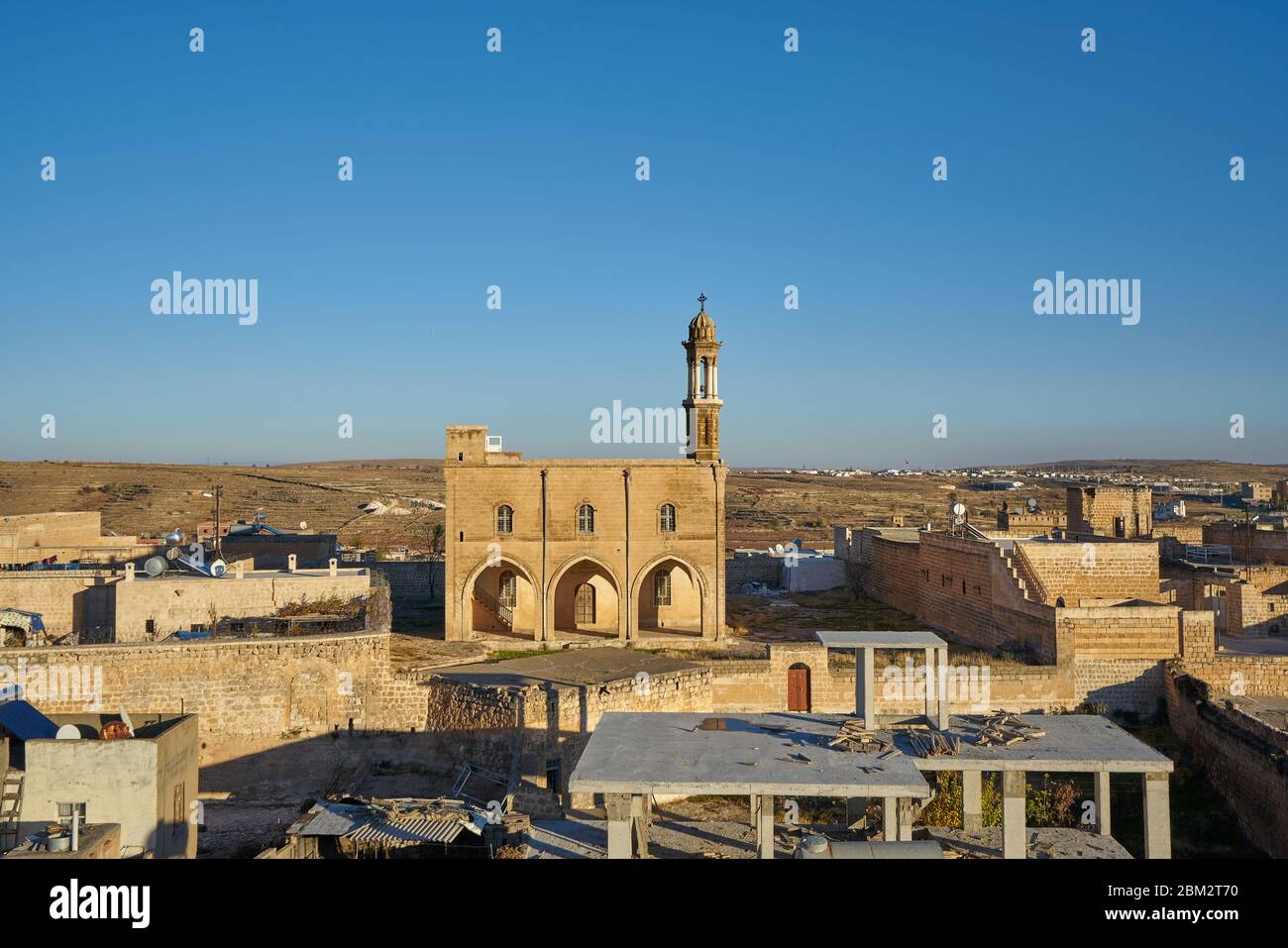 Panorama of Midyat with Bethil Kilisesi (Bethil Church) and traditional stone houses, Mardin, Turkey Stock Photo