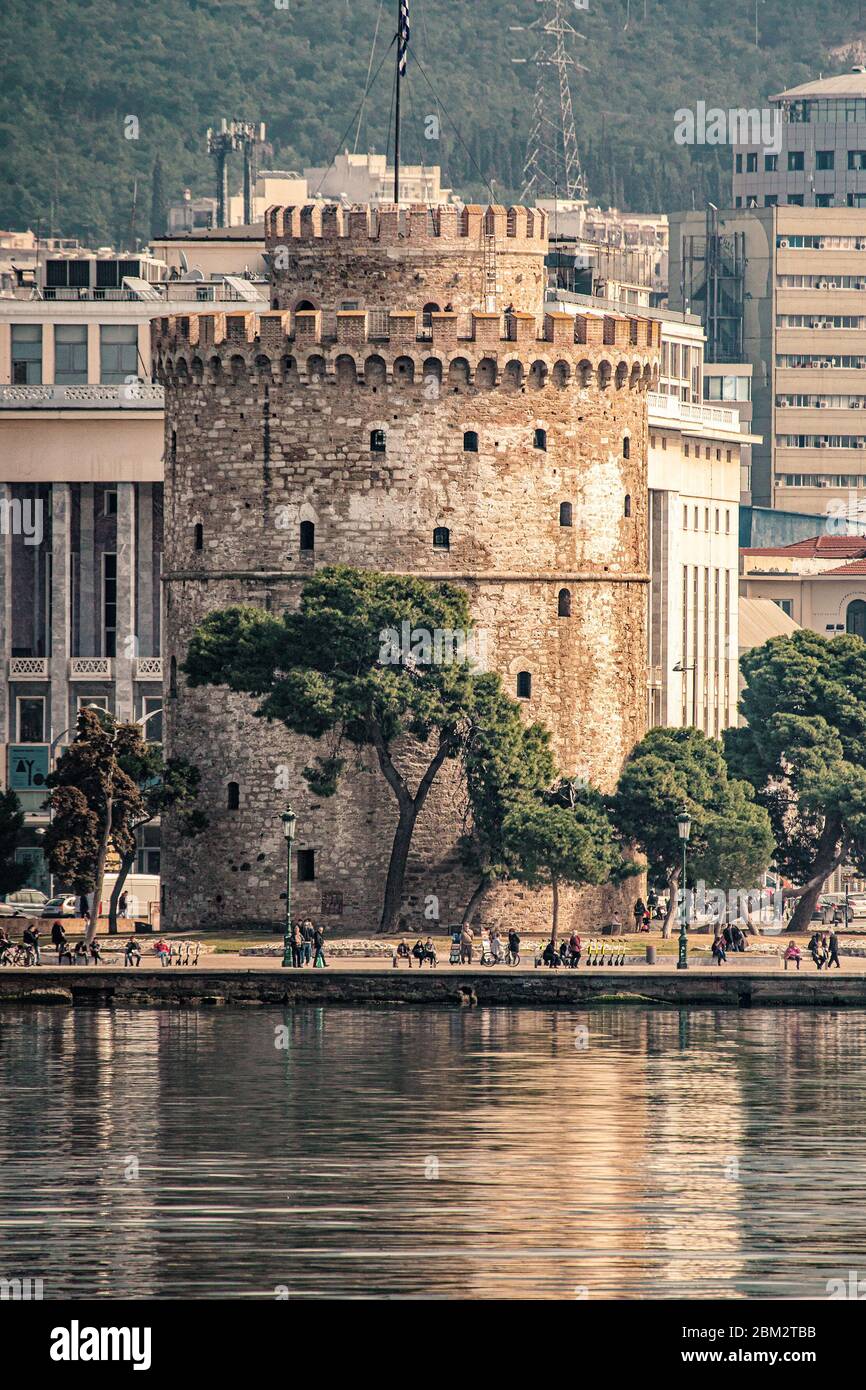 White Tower of Thessaloniki city, shot from the sea with tele lens, rare view Stock Photo