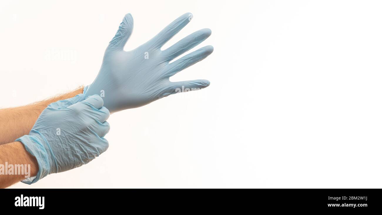 Doctor hands with surgical gloves isolated on white background. Medical