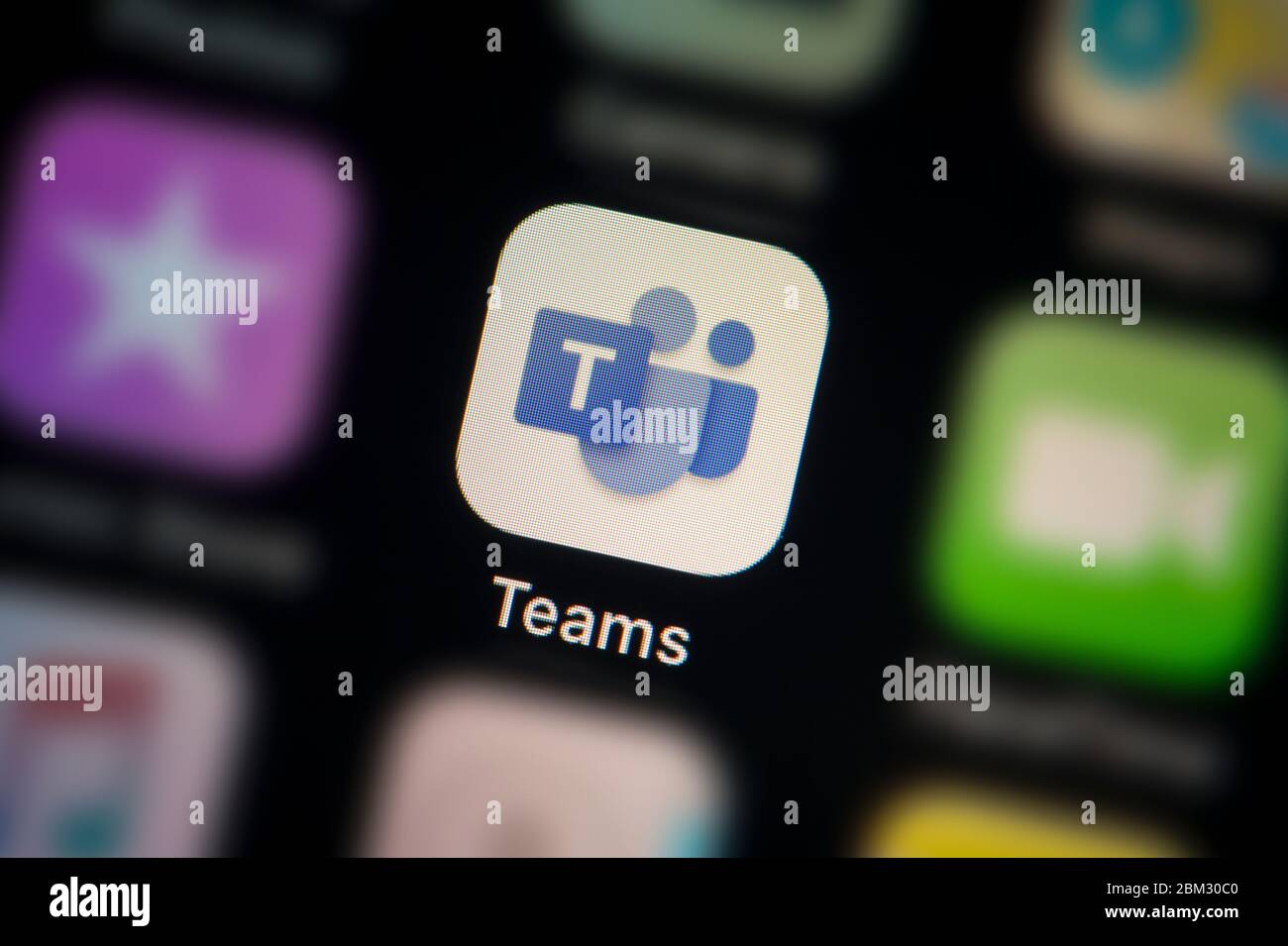 A close-up shot of the Microsoft Teams app icon, as seen on the screen of a smart phone (Editorial use only) Stock Photo