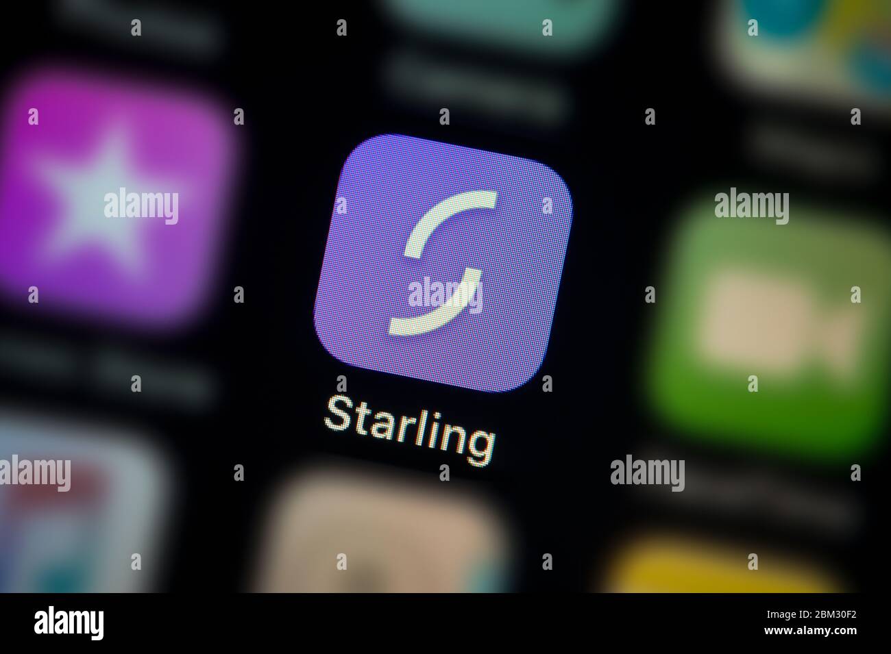 A close-up shot of the Starling Bank app icon, as seen on the screen of a smart phone (Editorial use only) Stock Photo