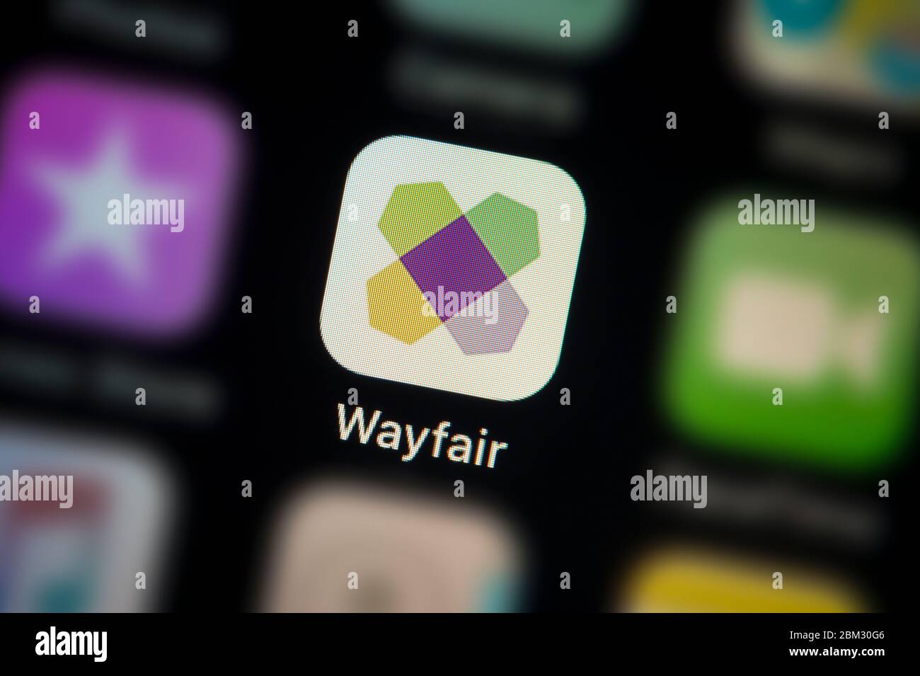 A close-up shot of the Wayfair app icon, as seen on the screen of a smart phone (Editorial use only) Stock Photo