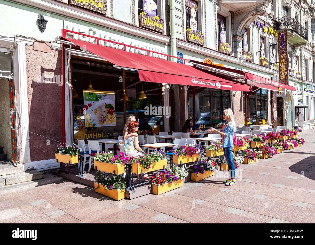 St Petersburg, Russia - August 5, 2015: Traditional summer outdoor street cafe 'Tea spoon' in summer sunny day Stock Photo