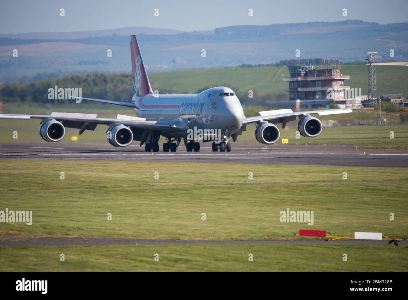 Prestwick, UK. 6th May, 2020. Pictured: A Cargolux Boeing 747-800 Freighter jumbo jet aircraft seen landing at Prestwick International Airport during the extended Coronavirus (COVID-19) Lockdown. Credit: Colin Fisher/Alamy Live News Stock Photo