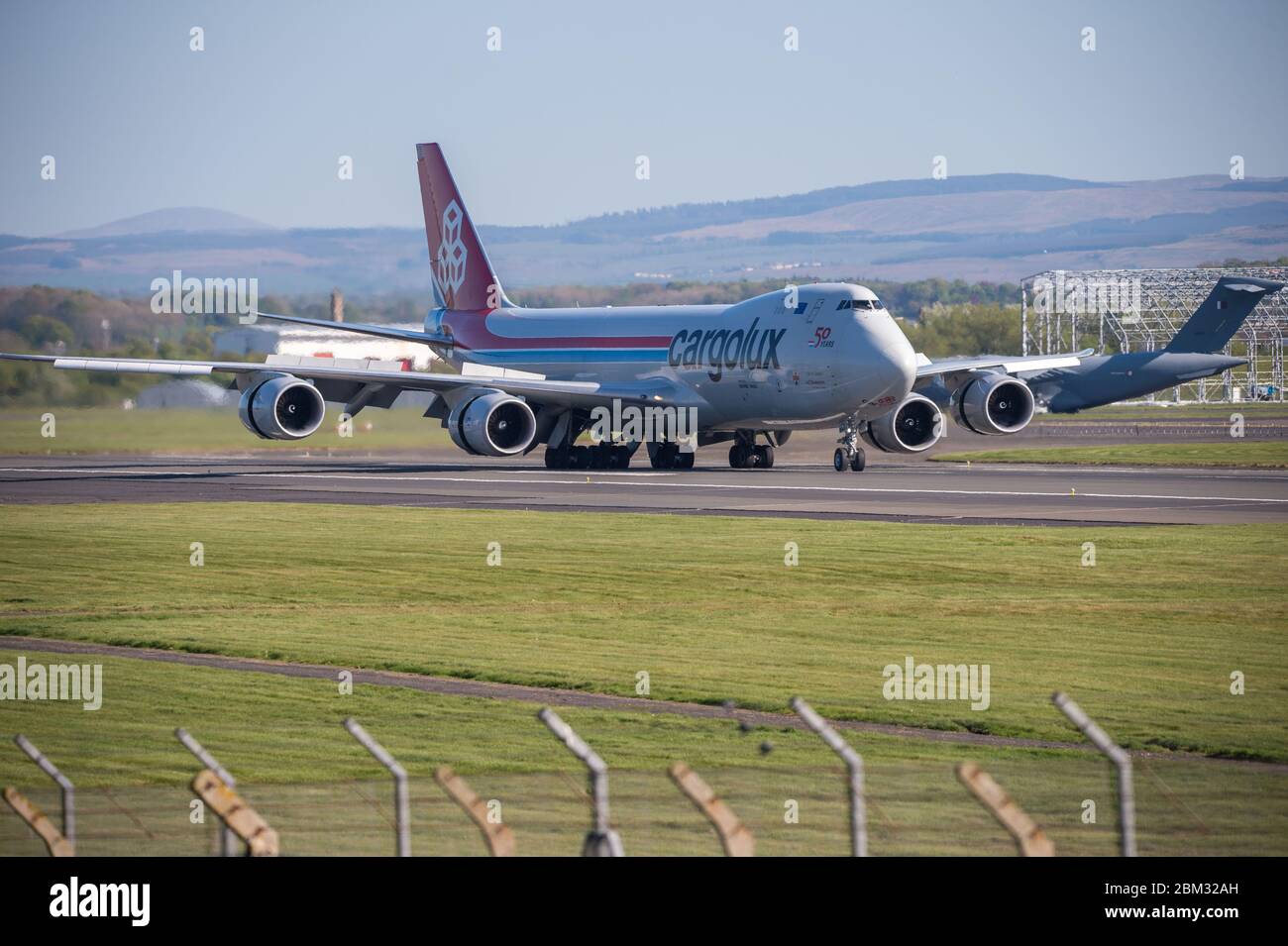 Prestwick, UK. 6th May, 2020. Pictured: A Cargolux Boeing 747-800 Freighter jumbo jet aircraft seen landing at Prestwick International Airport during the extended Coronavirus (COVID-19) Lockdown. Credit: Colin Fisher/Alamy Live News Stock Photo