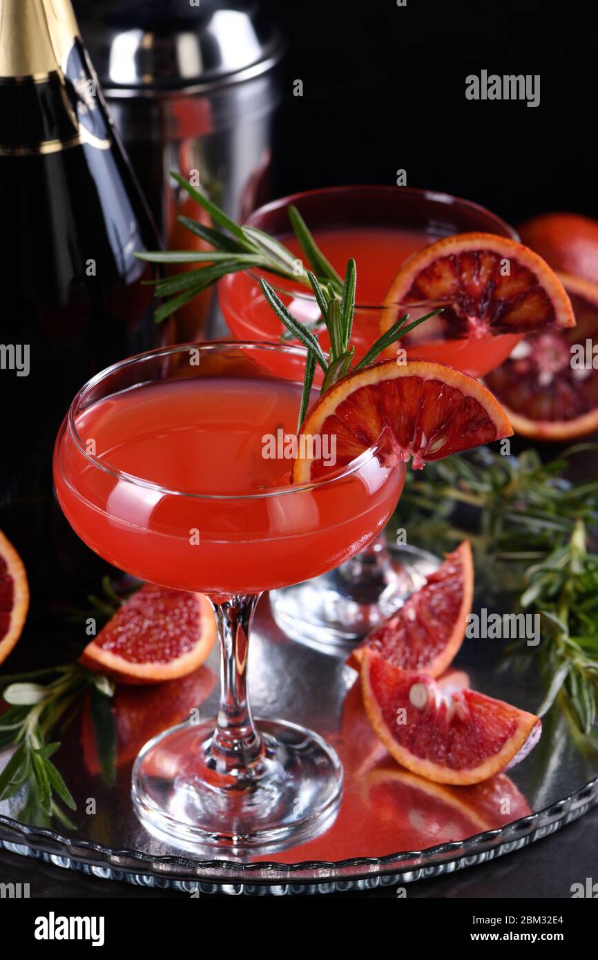 Bloody orange citrus champagne cocktail. Delicious, classy drink that everyone at your   party will love Stock Photo