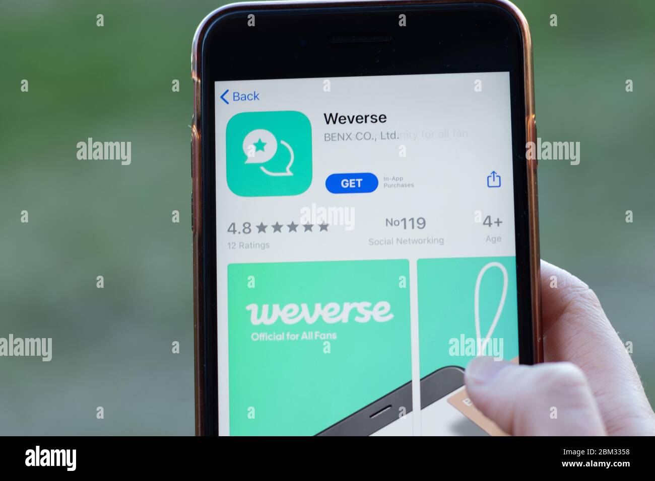 New York, USA - 1 May 2020: Weverse app logo close-up on phone screen, Illustrative Editorial Stock Photo