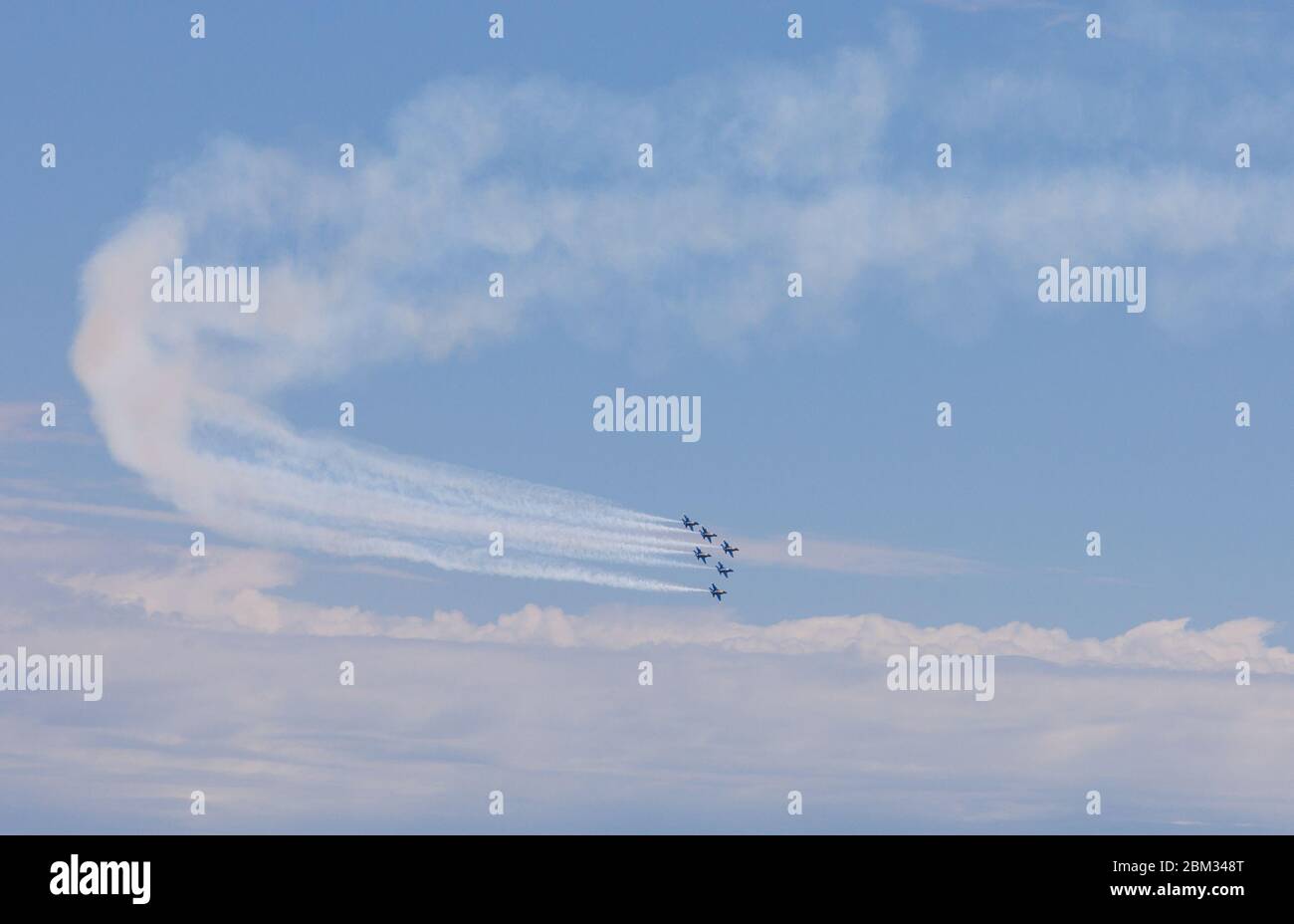 Dallas, USA. 6th May, 2020. A formation of the Blue Angels fly over Dallas and Fort Worth, Texas, the United States, on May 6, 2020. Jets from the U.S. Navy's Blue Angels flew over the southern states of Texas and Louisiana as a way to honor the frontline workers fighting the COVID-19 pandemic. The flyover started around noon in northern Texas Dallas-Fort Worth area and continued south over the largest Texas city of Houston and New Orleans in Louisiana. Credit: Dan Tian/Xinhua/Alamy Live News Stock Photo