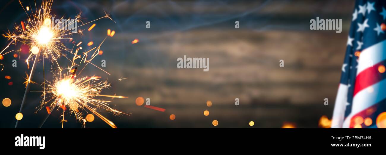 Vintage American Flag With Sparklers And Smoke On Rustic Wooden ...