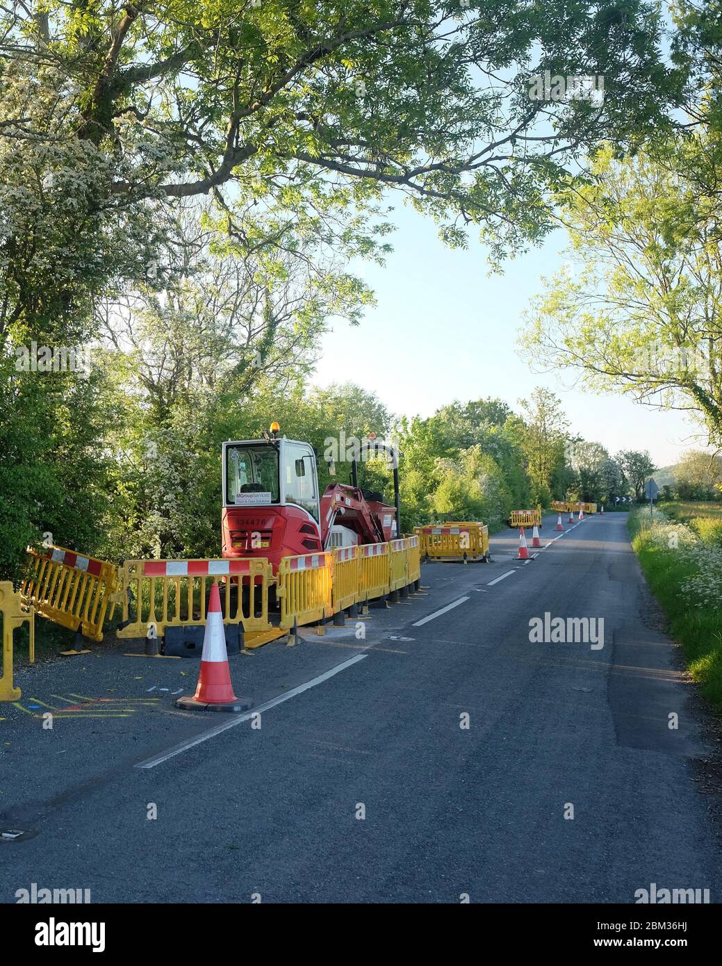 May 2020 - Gas main replacement work on a country road B3161 just South of Cheddar, in Somerset, UK Stock Photo