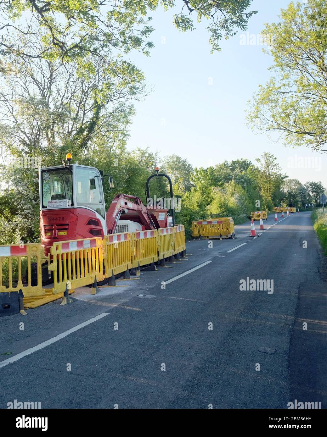 May 2020 - Gas main replacement work on a country road B3161 just South of Cheddar, in Somerset, UK Stock Photo