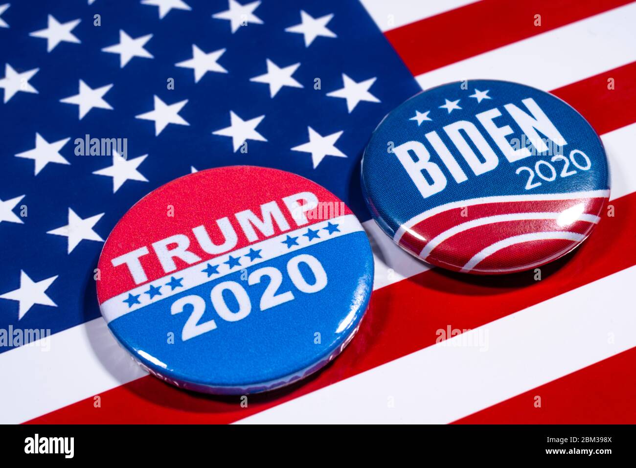 London, UK - May 5th 2020: Donald Trump and Joe Biden pin badges, pictured of the USA flag. The two men will be battling eachother in the 2020 US Pre Stock Photo