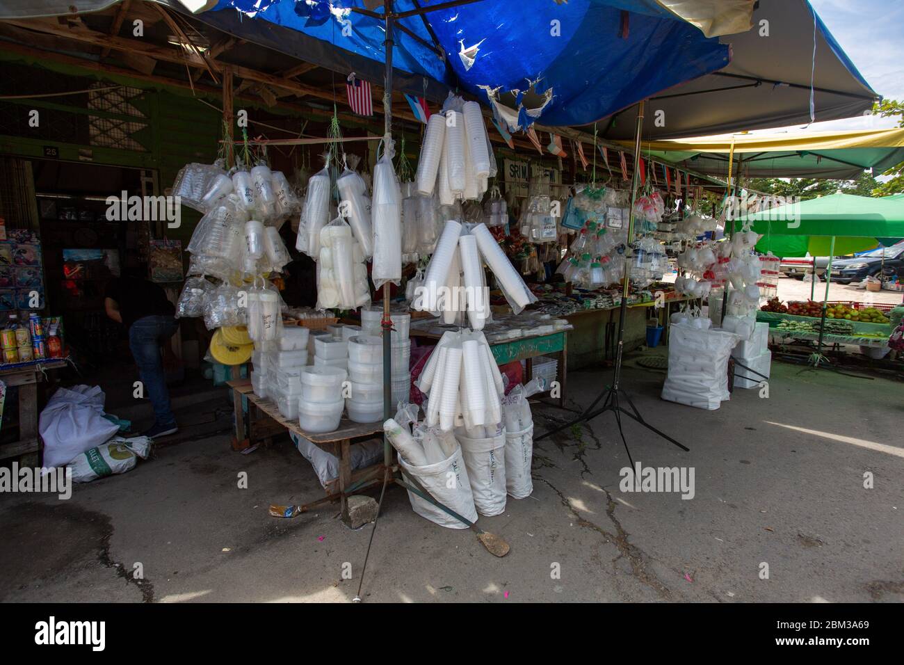 Tuaran, Malaysia, 6 May 2020 - Asian stall in Tuaran town selling plastic tupperware and other household items Stock Photo