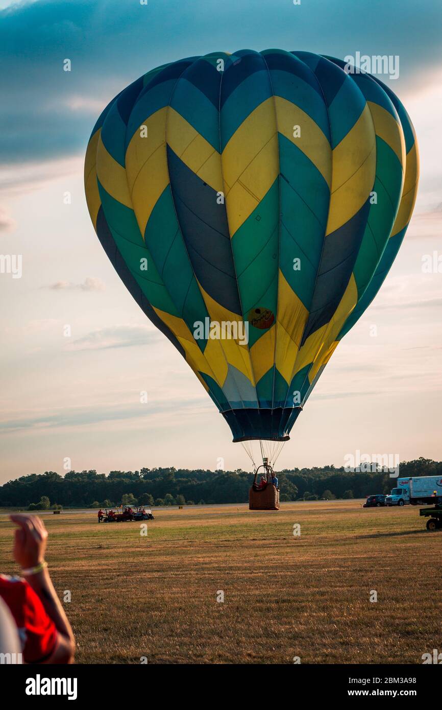 Hot air balloon landing at an airshow Stock Photo Alamy