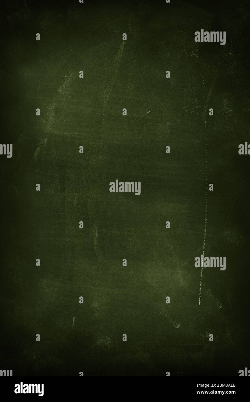 Chalk rubbed out on green chalkboard background Stock Photo