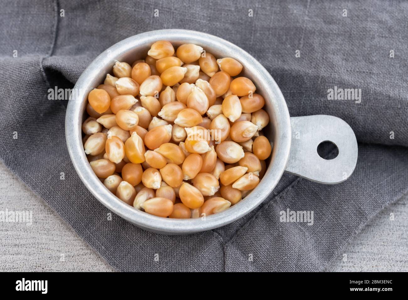 Popcorn Kernels in a Measuring Cup Stock Photo Alamy
