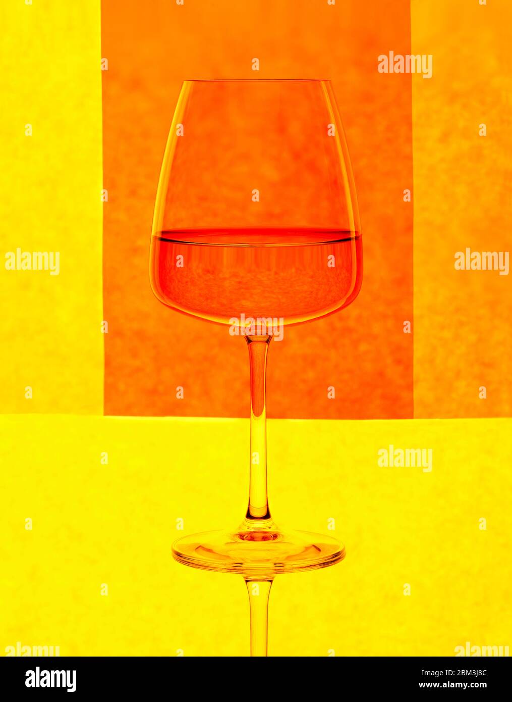 AN ORANGE GLASS CUP WITH BLACKDROP Stock Photo Alamy