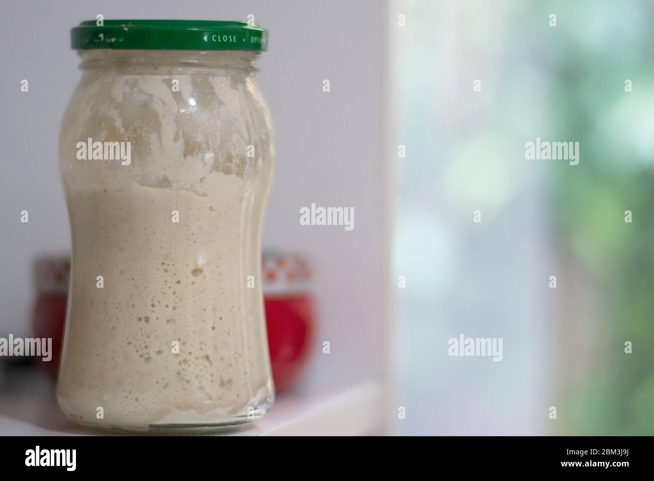 process of growth of sourdough Stock Photo