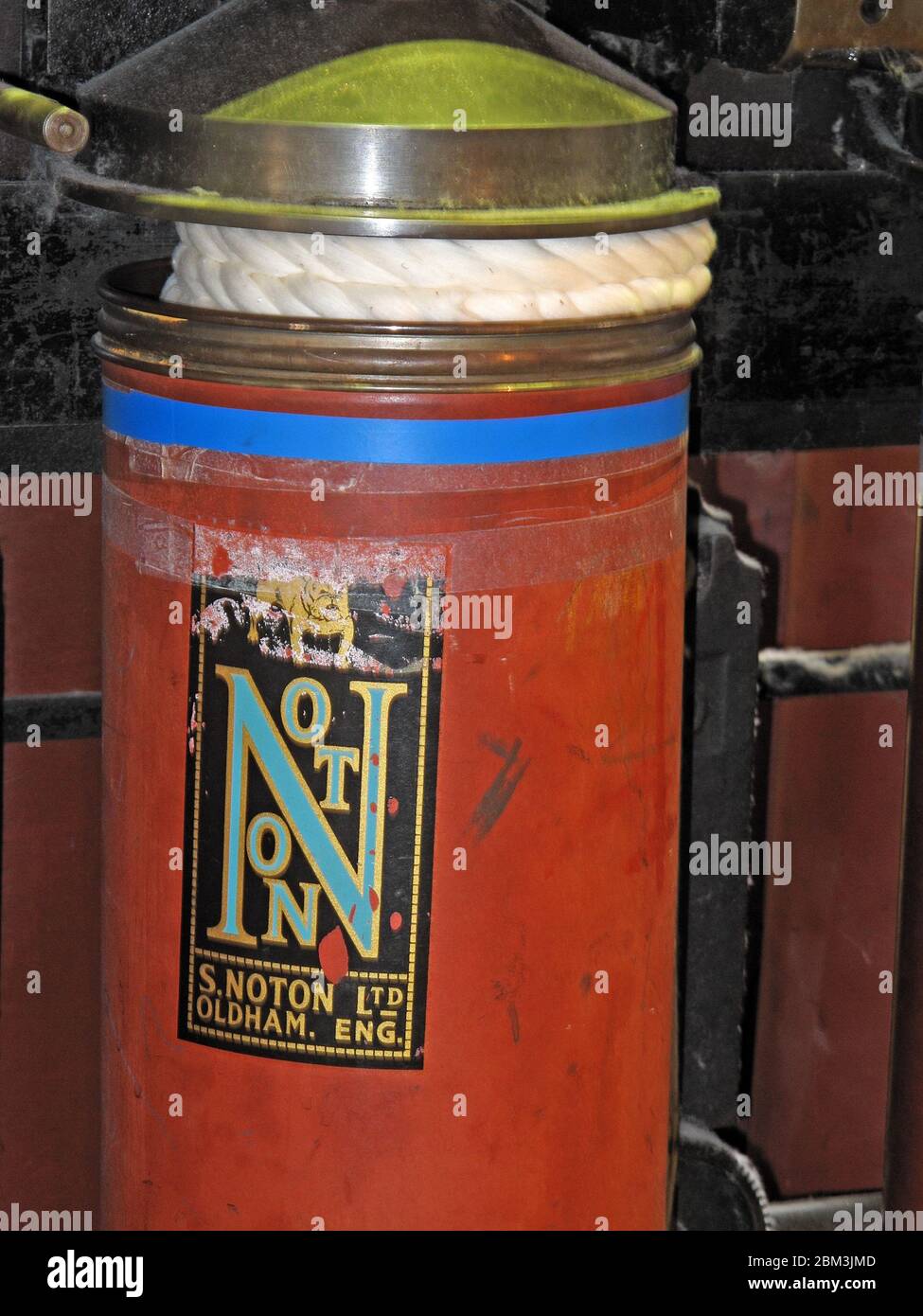 S. Noton Limited, Oldham, canister for holding cotton,textile bin, Manchester cotton mill,Lancashire, England, UK Stock Photo