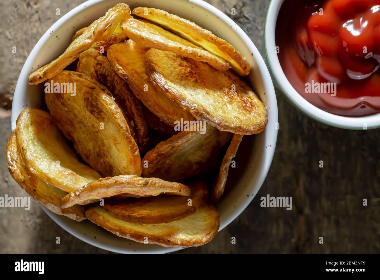 Homemade oven fried potato chips Stock Photo Alamy
