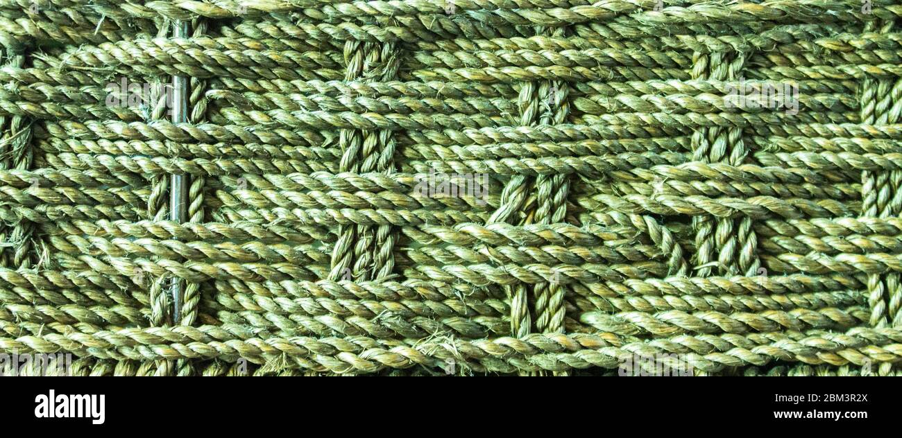 Close-up of woven rattan basket in green Stock Photo