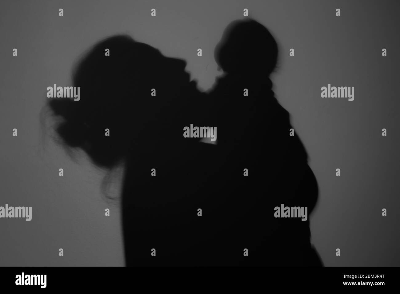 Silhouette Of Happy Mother and Baby, Happy Mother's Day concept Stock Photo