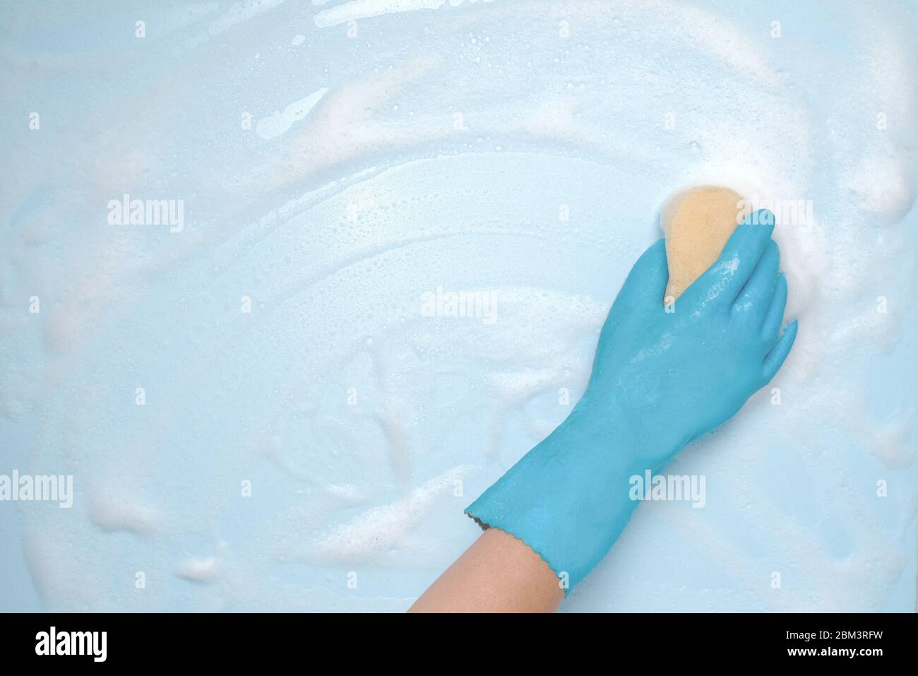 Squeaky foam cleaning of surface Stock Photo