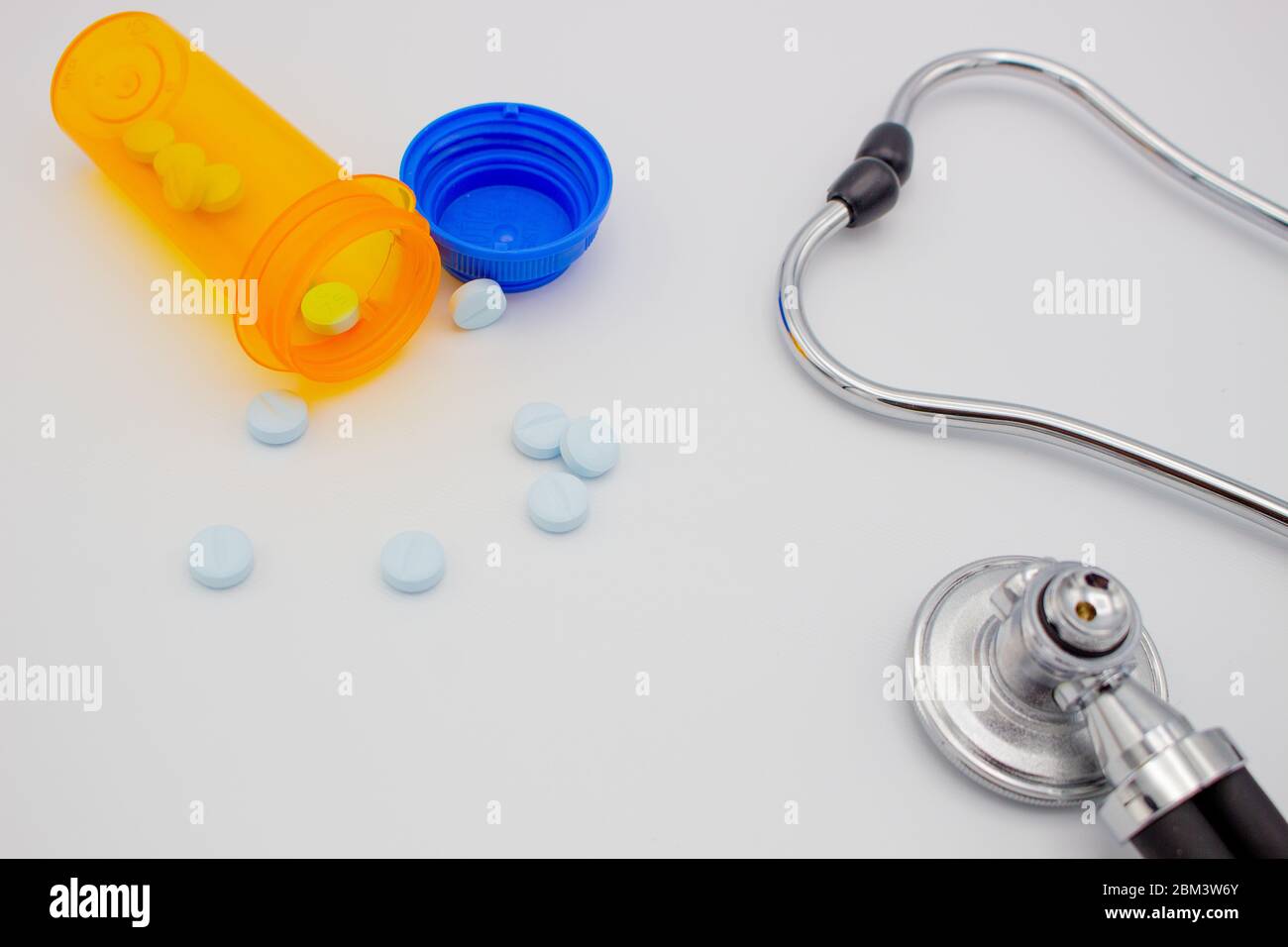 pills and stethoscope Stock Photo