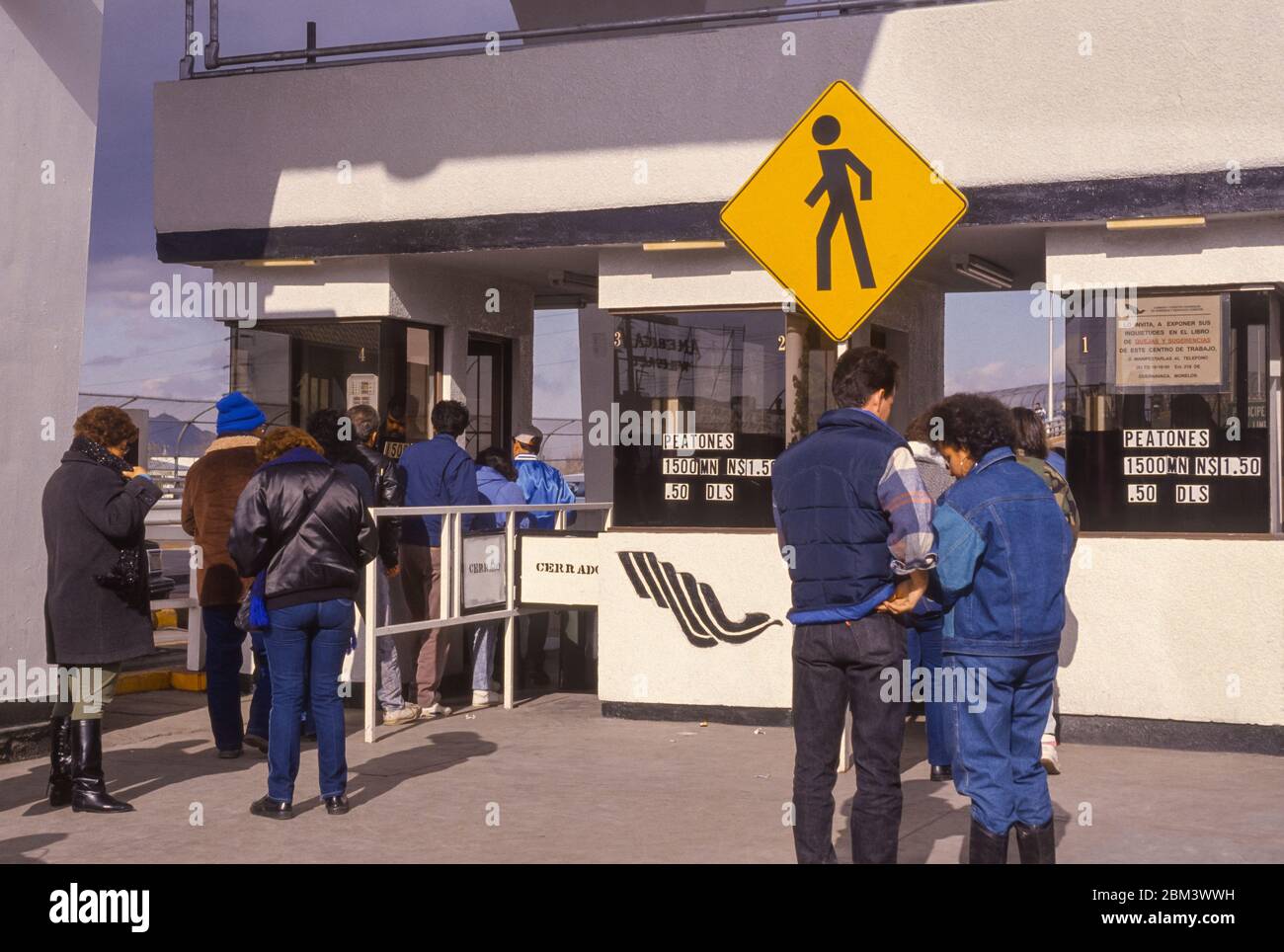 CIUDAD JUAREZ, MEXICO, DECEMBER 1992 - People at USA Mexico border customs check point. Stock Photo