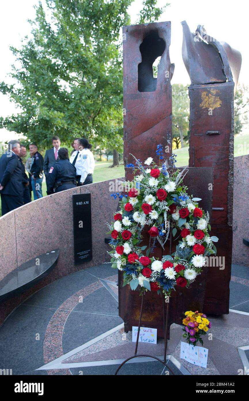 Austin Texas USA, September 11 2011: A memorial wreath is laid at a remnant of the Twin Towers during a memorial ceremony at the Texas State Cemetery commemorating the 10th anniversary of the September 11 terrorist attacks. ©Bob Daemmrich Stock Photo