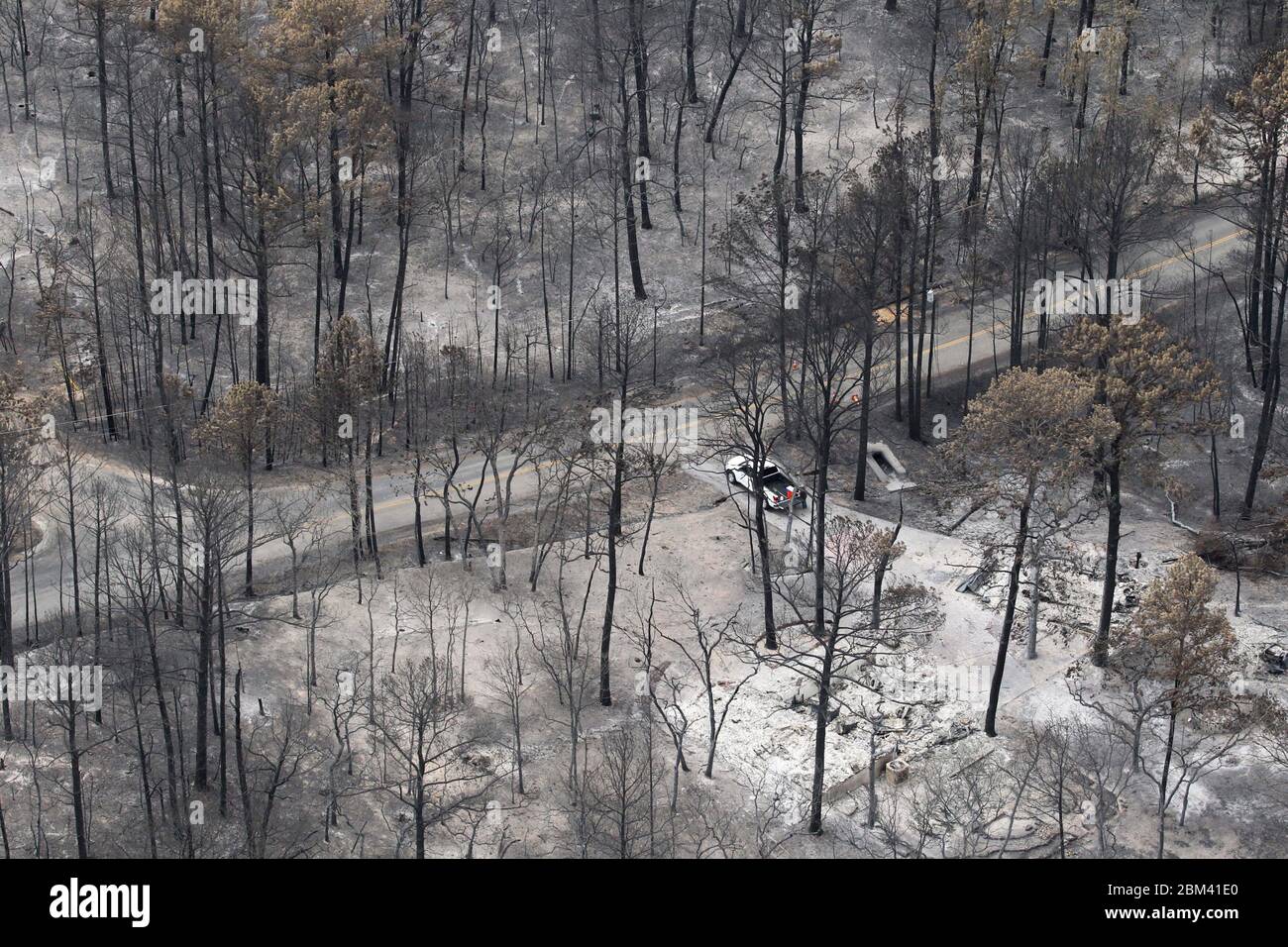 Bastrop County USA, September 16 2011: Aerial of fire damage where wildfires burned 38,000 acres and over 1,500 homes with two deaths reported. The trees in Bastrop State Park were the hardest hit with over 95% of the park acreage blackened or destroyed. ©Bob Daemmrich Stock Photo