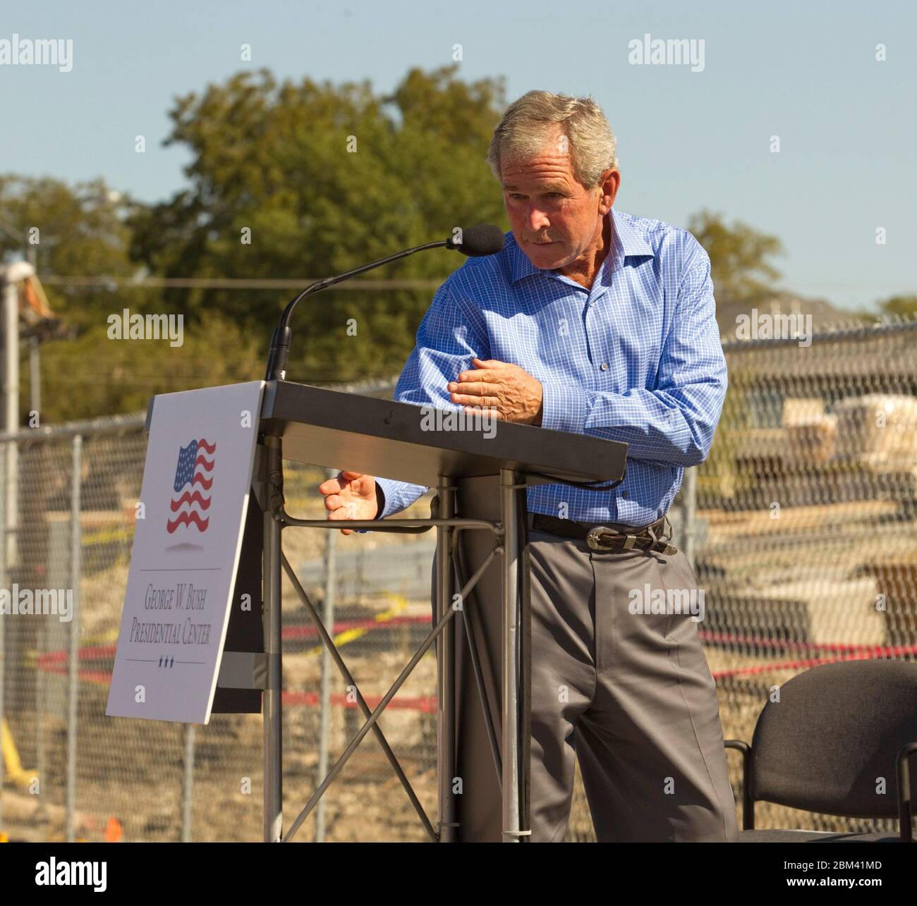 Dallas, Texas USA, October 3, 2011: Former U.S. President George W. Bush speaks at the construction site of the George W. Bush Presidential Center on the campus of Southern Methodist University. When the Center is completed in the spring of 2013, it will comprise a 226,000-square-foot building with offices, presidential archives, research, restaurants and classroom space over the 25-acre site.   ©Bob Daemmrich Stock Photo