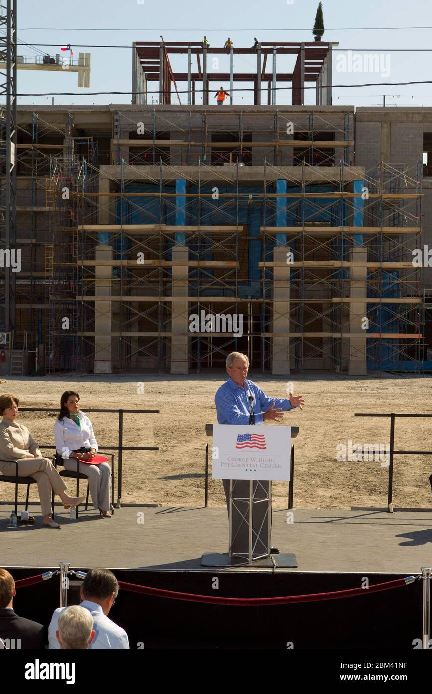 Dallas, Texas USA, October 3, 2011: Former U.S. President George W. Bush speaks at the construction site of the George W. Bush Presidential Center on the campus of Southern Methodist University. When the Center is completed in the spring of 2013, it will comprise a 226,000-square-foot building with offices, presidential archives, research, restaurants and classroom space over the 25-acre site.   ©Bob Daemmrich Stock Photo