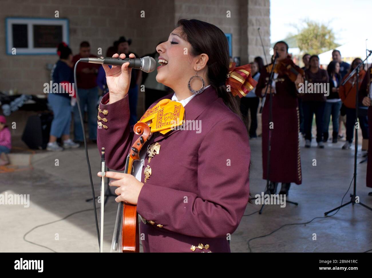 Kyle, Texas USA, November 2011: Members of Mariachi Nueva Generacion from Texas State University perform at a 'Day of the Dead' or Dia de Los Muertos celebration. Day of the Dead is a Mexican national holiday and focuses on gatherings of family and friends to pray for a departed loved ones. ©Bob Daemmrich Stock Photo
