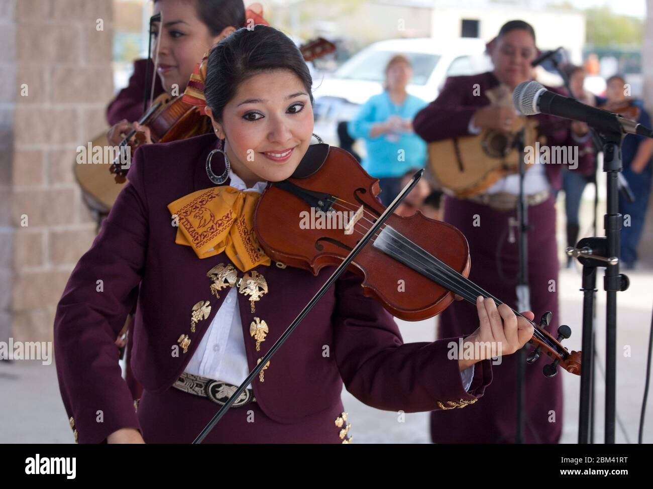 Kyle, Texas USA, November 2011: Members of Mariachi Nueva Generacion from Texas State University perform at a 'Day of the Dead' or Dia de Los Muertos celebration. Day of the Dead is a Mexican national holiday and focuses on gatherings of family and friends to pray for a departed loved ones. ©Bob Daemmrich Stock Photo