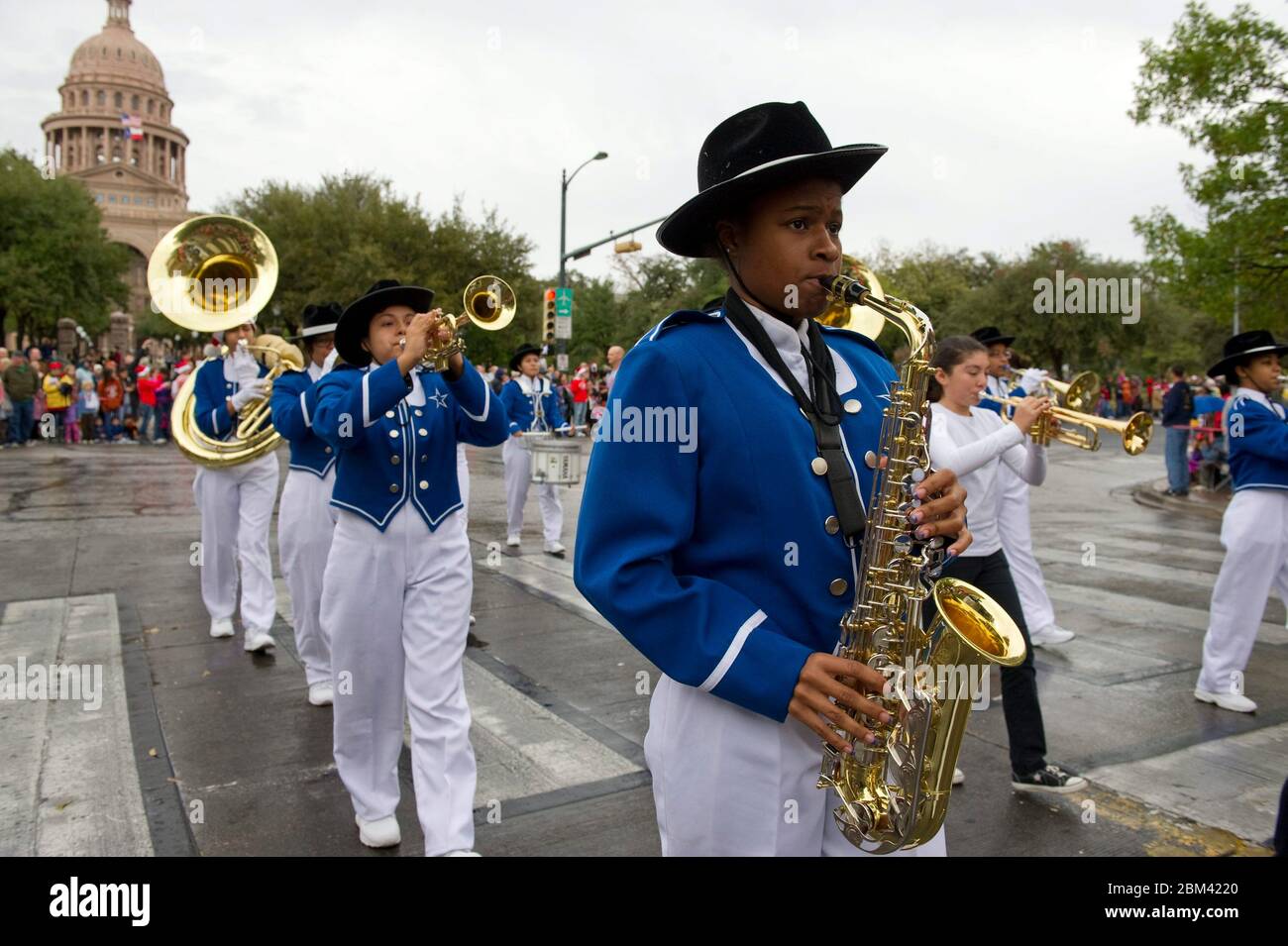 Austin, Texas USA, November 26. 2011: Members of a high school marching band participate in the annual Children Giving to Children parade in downtown, at which children bring toys for holiday distribution to needy families. ©Bob Daemmrich Stock Photo