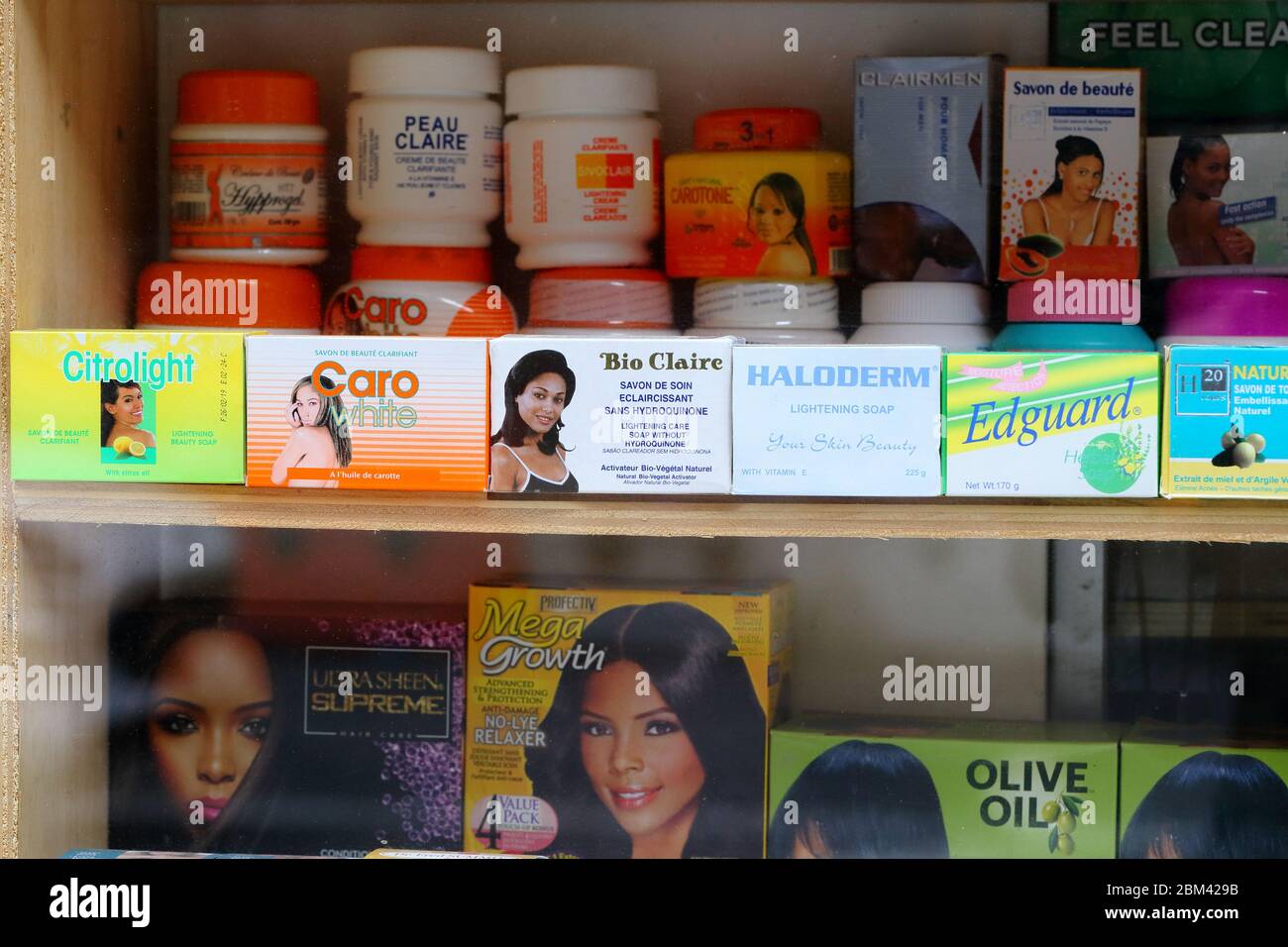 Skin lightening soaps and beauty products in a shop window display. Stock Photo